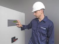 Engineer checking Cathelco ICCP control panel