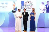 H.E Khamis Juma receiving the Award